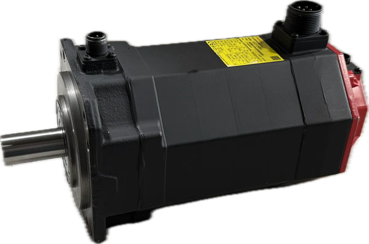 A larger Fanuc AC servo motor with a flanged mount, two connectors on the top face, and a yellow specification label.